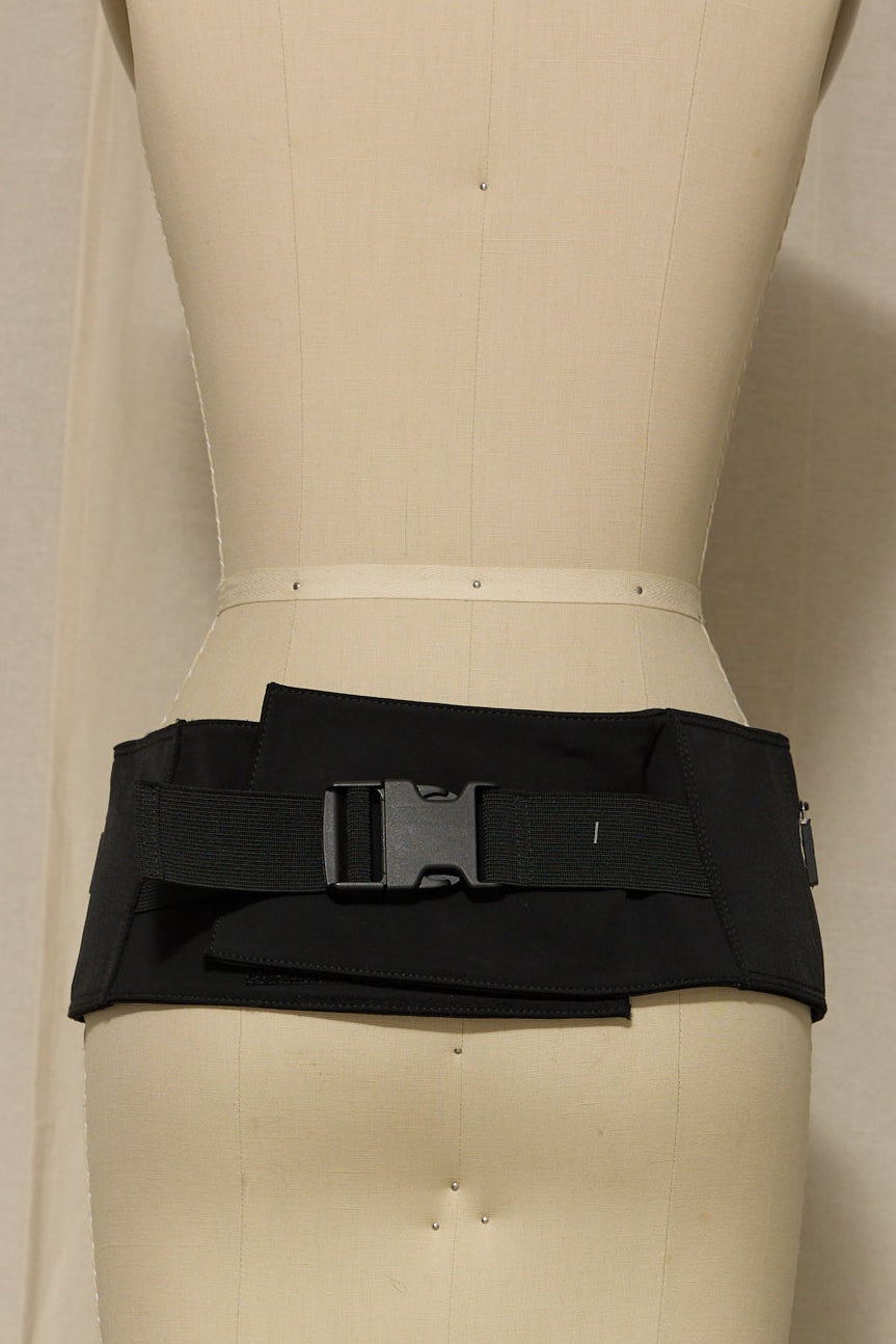Black belt on a mannequin against a neutral background