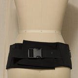 Black belt on a mannequin against a neutral background