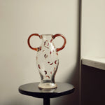 Discover the Modern Vintage Guta Glass Vase in Brown – a handcrafted consignment piece, featuring classic Guta glass craftsmanship with a rich, warm hue.