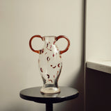 Discover the Modern Vintage Guta Glass Vase in Brown – a handcrafted consignment piece, featuring classic Guta glass craftsmanship with a rich, warm hue.