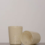 Discover the YAKUSH Blur Glass – a 4.7" tall, 3.5" wide handcrafted drinking glass made from recycled eco-friendly materials, perfect for water or cocktails.