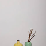 Discover the Savruk Diffuser Low – a semi-porcelain and glass home fragrance diffuser, featuring ginger, patchouli, and oud notes with birch sticks for natural scent diffusion.