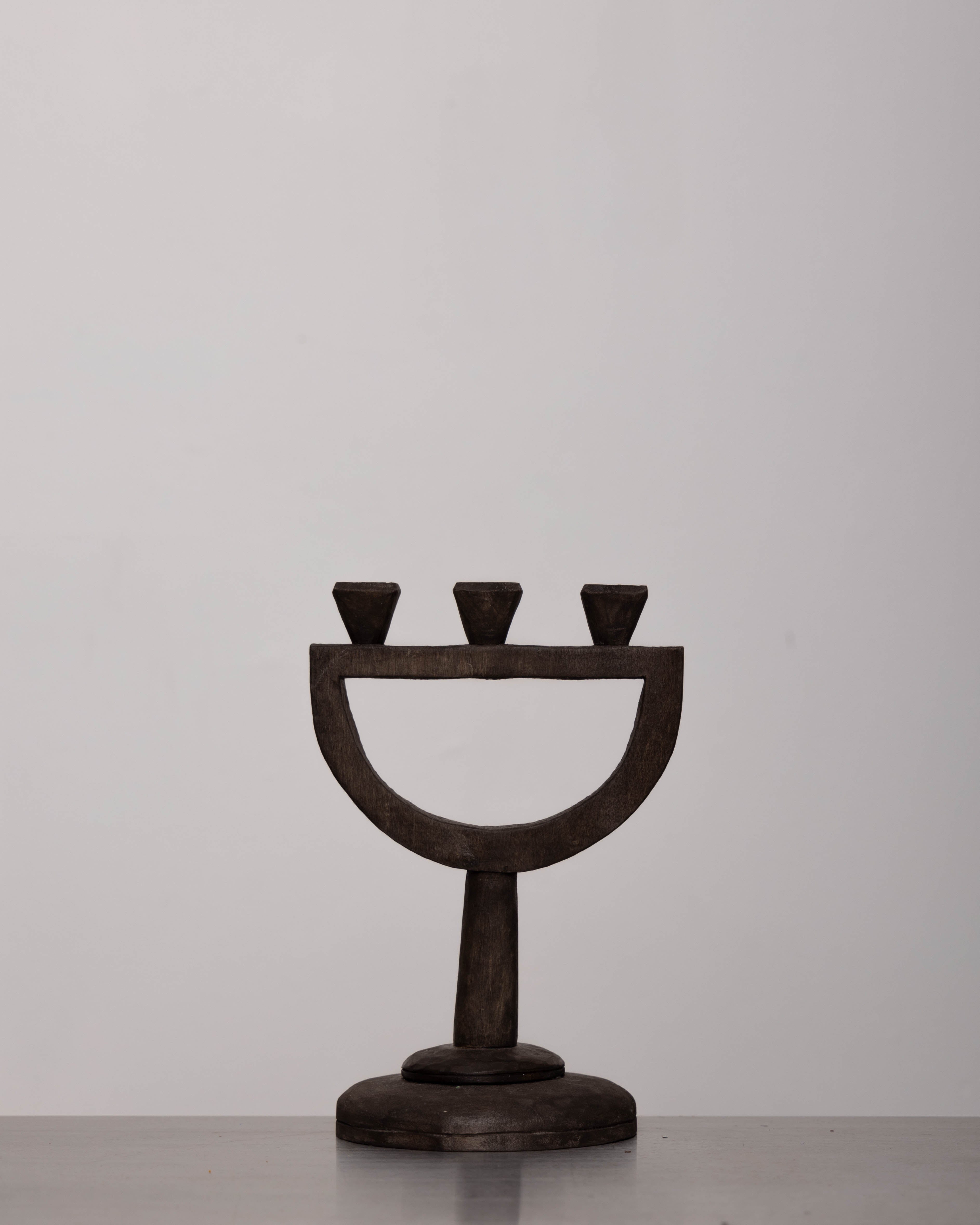 Discover the HutsulAuthentica Handmade Wooden Candlestick – an 11" x 7.5" artisan-crafted wooden decor piece, blending traditional craftsmanship with timeless elegance.