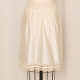 Ivory Nylon Slip Skirt with Tan Lace Trim and Side Slit